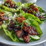 Savory Korean BBQ Beef Lettuce Wraps with a vibrant kimchi crunch, ready to assemble.
