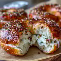Fluffy high-protein bagels topped with savory everything seasoning, baked to golden perfection and ready for a nutritious breakfast.